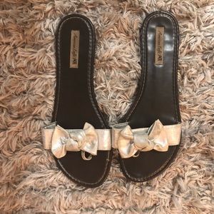 Silver bow slip on sandals